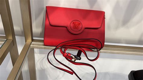 versace vitello red|Versace hobo bags.